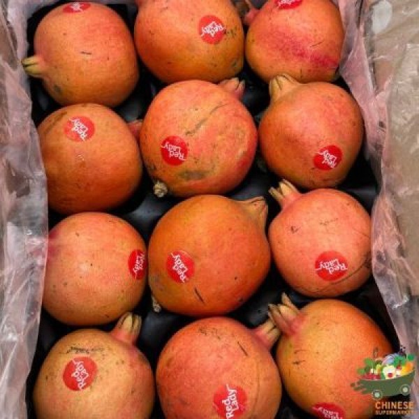 A box of 12 pomegranates imported from India