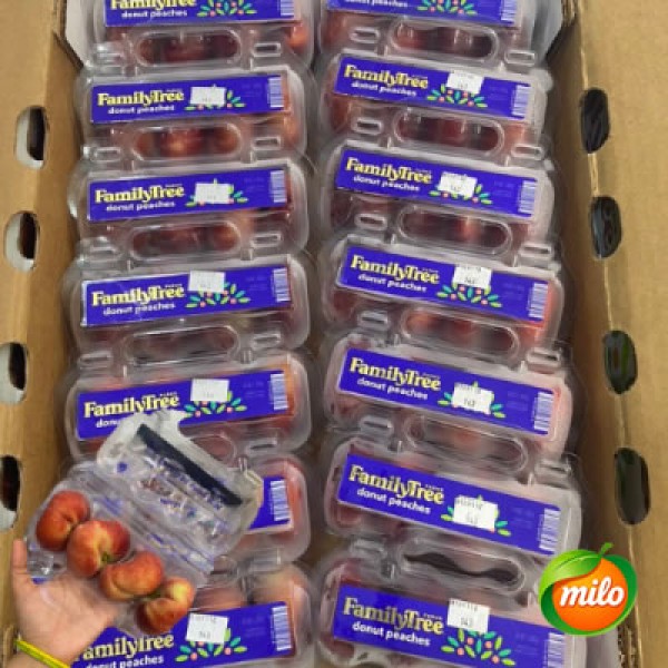 A box of 14 imported peaches from the United States