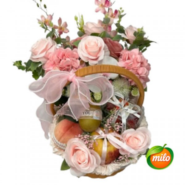 A pink fruit gift basket