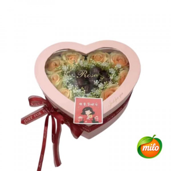 A basket of mixed fruit gift boxes