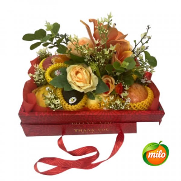 A basket of mixed fruit gift boxes