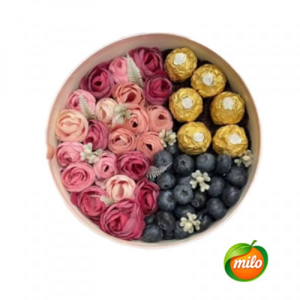 A basket of chocolate and blueberry gift boxes